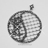Fashionable jewelry. Silver pendant with marcasites