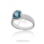 Silver ring with blue topaz