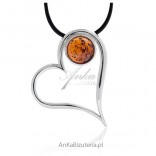 Silver heart pendant with amber. A large silver pendant