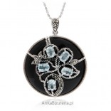 Silver pendant with blue topaz and onyx. Original jewelry
