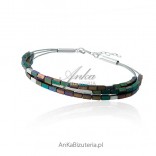 Silver bracelet with colored hematite.