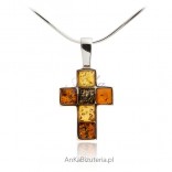 Cross with amber. Silver jewelry