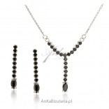 A set of silver jewelry with black cubic zirconia