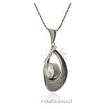 Silver oxidized pendant with a large zircon