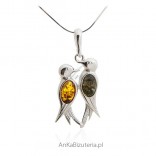 Silver jewelry: Silver pendant with amber. Two birds