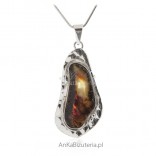 Silver pendant with natural amber. Beautiful unique jewelry