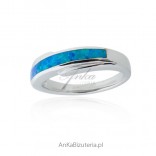 A silver ring with blue opal