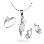 A set of silver jewelry with white opal