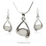 Set of silver jewelry with white opal. Fashionable jewelry