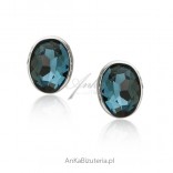 Silver earrings with blue Montana zircons