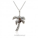 Jewelry with amber. Silver palm pendant