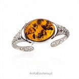 An elegant silver bracelet with amber