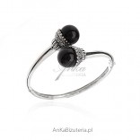 An elegant silver bracelet with marcasites and black onyx