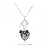 Silver jewelry - a stylish heart with a black bow - a silver necklace