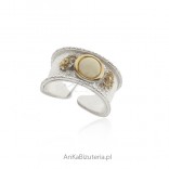 Silver ring with white gold-plated amber - Artistic jewelry