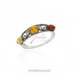 Silver ring with colorful amber