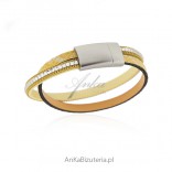 Stainless steel bracelet on yellow leather with cubic zirconia
