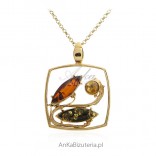 Silver gilt pendant with colored amber
