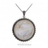 Silver jewelry pendant with marcasites and white mother of pearl