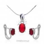 Silver jewelry complete with burgundy zircon