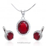 Set silver jewelry with red zircon