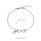 Silver bracelet with white heart and infinity