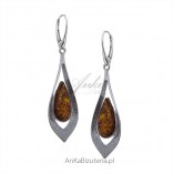 Long silver earrings with amber