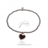 Silver bracelet with black heart gilded with pink gold