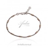 Silver FANTASIA bracelet with gilded beads