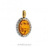 Silver pendant with amber oxidized and gold plated