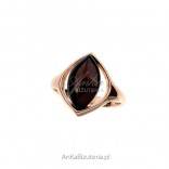 Silver ring with pink gold and cherry amber