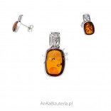 Set silver jewelry with amber openwork