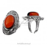 Silver ring with amber in cherry color