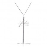 A silver necklace is a hanging tassel