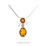 Silver pendant with gold-plated cognac amber