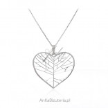 Silver necklace on a long chain with a big heart
