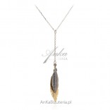 Silver necklace with oxidized and gold feathers