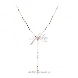 Silver rosary necklace inlaid with pink gold with black onyxes