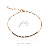Silver bracelet gilded with pink gold with black cubic zirconia