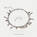 Silver bracelet with balls and pearls
