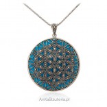 Silver pendant with marcasites and a blue jewelery stone