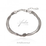 Silver bracelet with various "loops" chains