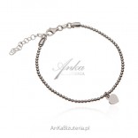Silver ball bracelet with heart