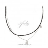 Silver necklace with black spinels and openwork tags