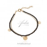 Gold-plated silver bracelet with black spinels and chain with openwork tags