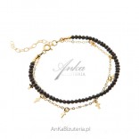 Silver jewelry - black spinele bracelet and gold-plated chain with crosses