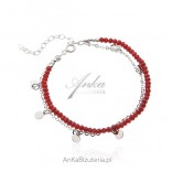 Silver bracelet with red spinels and chain with circles