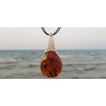 Silver pendant with cognac amber - "head in the clouds"