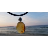 Beautiful amber pendant with rubella