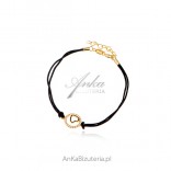 Gold-plated silver bracelet with a heart in a circle
